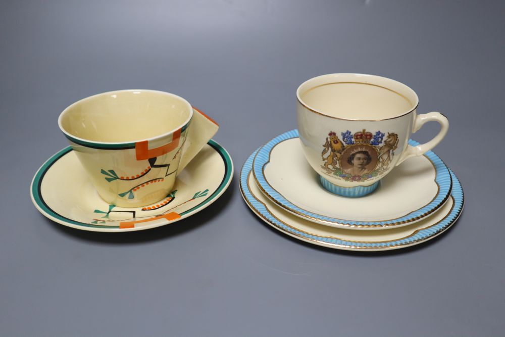 A Clarice Cliff Ravel pattern tea cup and saucer and a Queen Elizabeth II coronation trio, 1953
